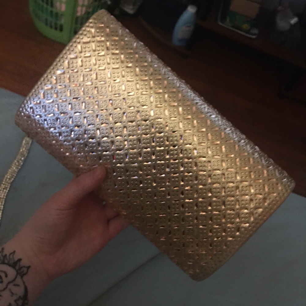 Rose gold clutch bag